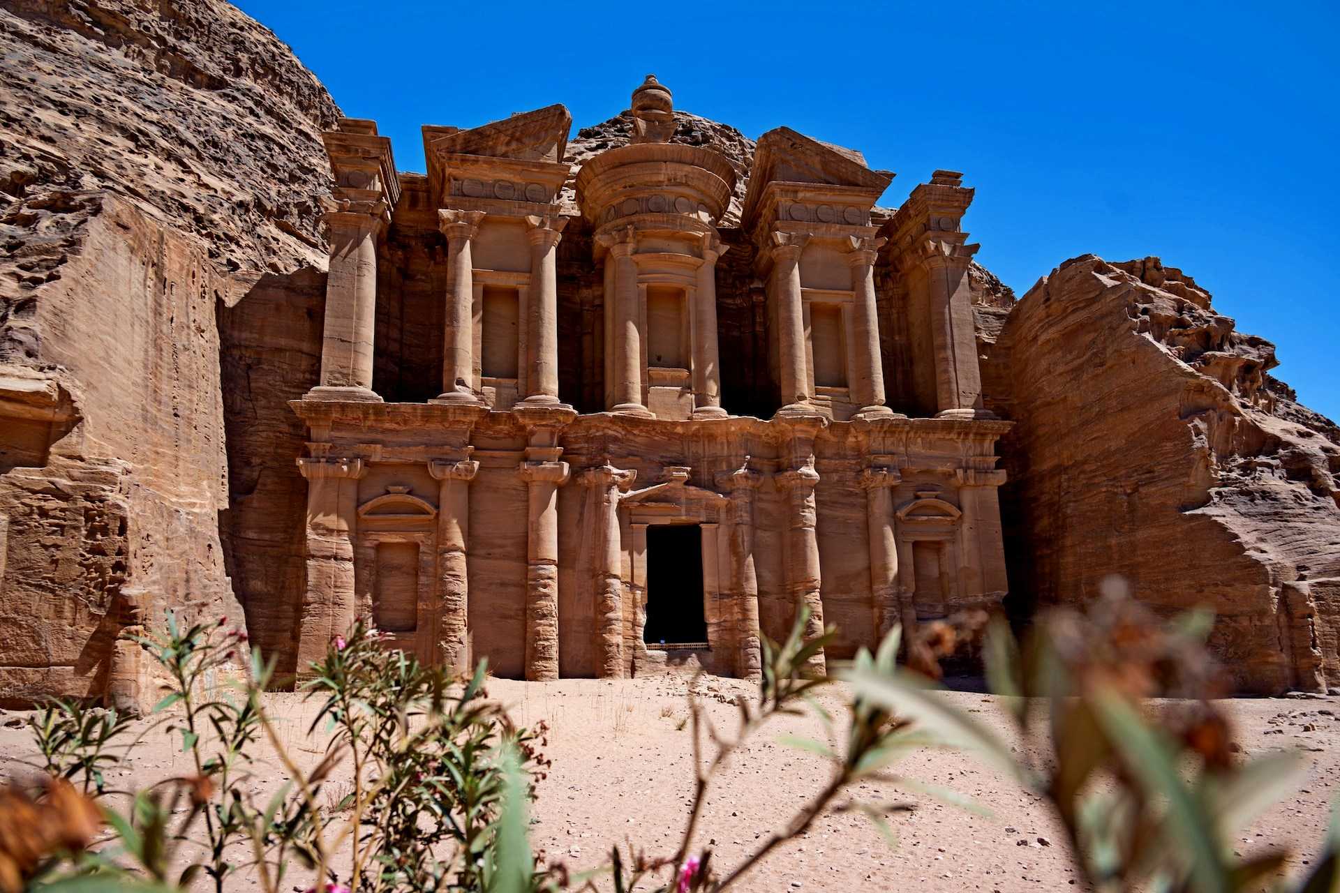 2-Day Trip to Petra; Petra Jordan; Wadi Musa; Jordan tourism; ancient cities; Rose City; Treasury (Al-Khazneh); Monastery (Al-Deir); Siq; Petra Museum; Petra by Night; Bedouin culture; Jordanian hospitality; Petra Guides; camel rides; horseback riding; hiking trails; Petra hotels; Petra archaeological park; Petra entry fees; Petra tickets; Jordan travel packages; 2-day itinerary; Jordan vacation; Petra in Jordan